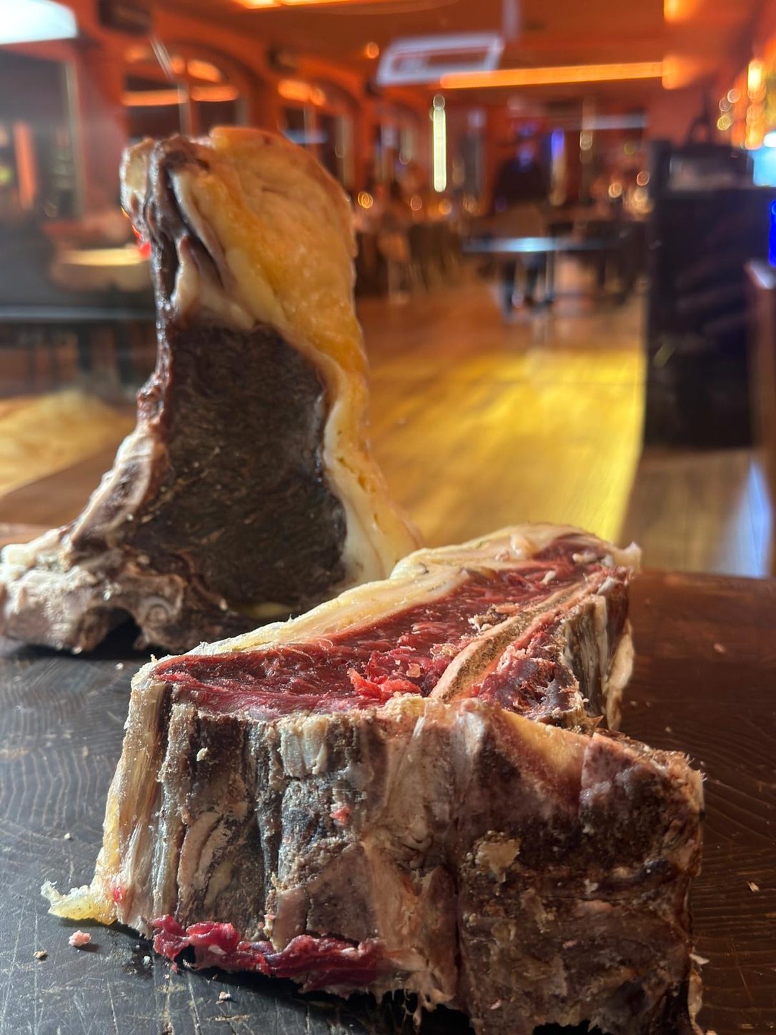 Bone-in steaks dry-aged in our ageing room, ready for the grill